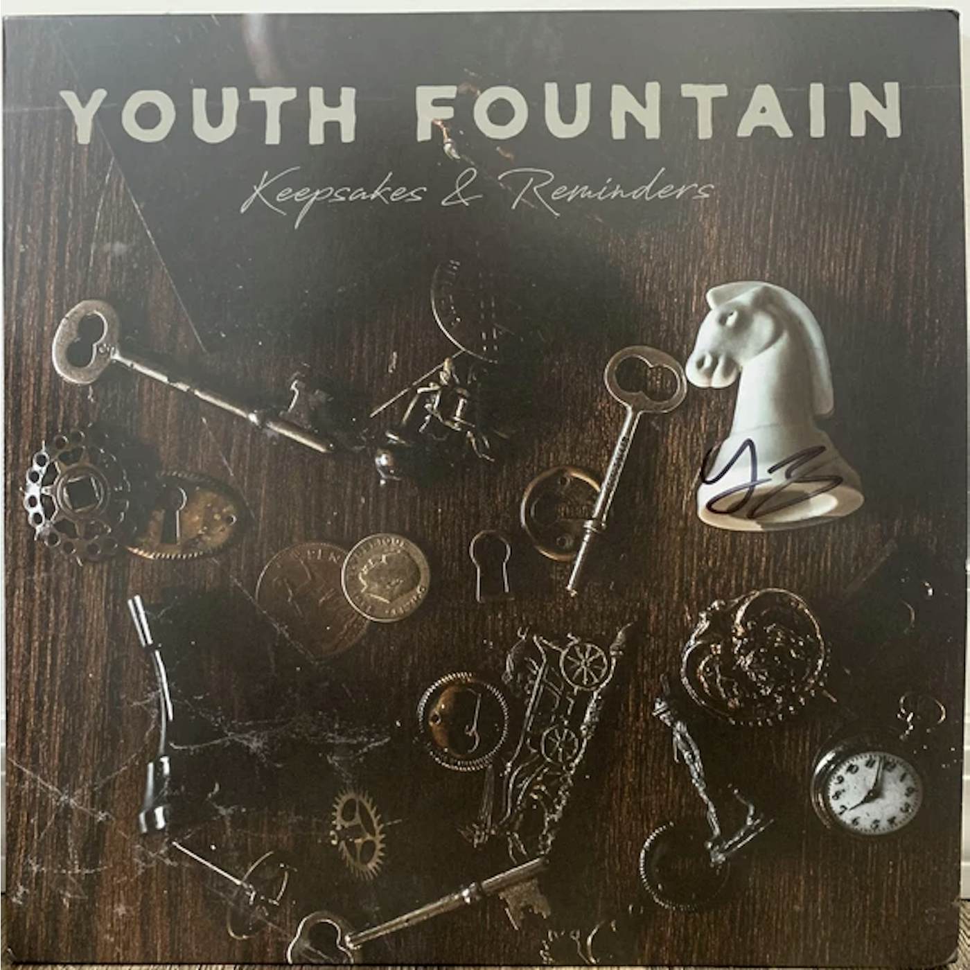Youth Fountain KEEPSAKES & REMINDERS (BROWN IN BEER W/ HEAVY BONE SPLATTER VINYL) (I) Vinyl Record